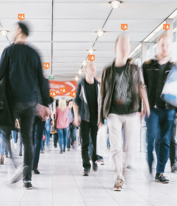 people walking in a mall with +1 counters on their heads